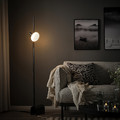 HÅRSLINGA / MOLNART Floor lamp with light bulb, black/donut-shaped opal white