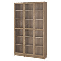 BILLY / OXBERG Bookcase combination w glass doors, oak effect/clear glass, 120x30x202 cm