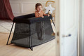 BABYBJÖRN Travel Cot/Playpen Light, Black + sheet, 0-3