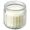 JÄMLIK Scented candle in glass, Vanilla/light beige, 12 hr