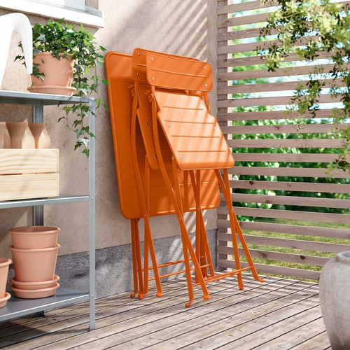 SUNDSÖ Table and 2 folding chairs, outdoor bright orange/bright orange, 65x65 cm