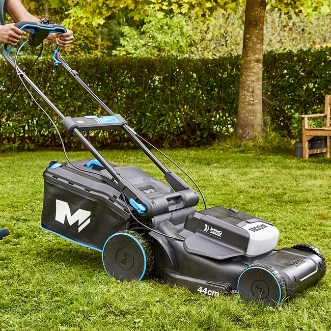 Corded rotary outlet lawnmower